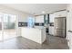 Modern white kitchen with stainless steel appliances and island at 2106 Childress Sw Dr, Atlanta, GA 30311