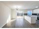 Modern white kitchen with stainless steel appliances and island at 2106 Childress Sw Dr, Atlanta, GA 30311