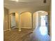 Bright entryway with hardwood floors and archways at 475 Charleston Pl, Villa Rica, GA 30180