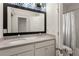 Bathroom featuring double sink vanity, a large mirror, and a separate toilet and shower at 770 Grove Bnd, Decatur, GA 30030