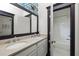 Bathroom with double vanity and a view of the shower at 770 Grove Bnd, Decatur, GA 30030