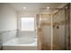 Bathroom with garden tub and separate shower at 816 Graeme Dr, Mcdonough, GA 30252