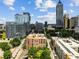 Aerial view showcasing the building and surrounding cityscape at 115 W Peachtree Nw # 704, Atlanta, GA 30313