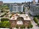 Aerial view of a brick building in the city, surrounded by other buildings and roads at 115 W Peachtree Nw # 704, Atlanta, GA 30313