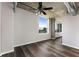 Bright bedroom with hardwood floors, large window and ceiling fan at 115 W Peachtree Nw # 704, Atlanta, GA 30313