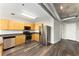 Modern kitchen with stainless steel appliances and wood cabinets at 115 W Peachtree Nw # 704, Atlanta, GA 30313