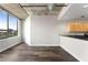 Spacious living room with hardwood floors and exposed ductwork at 115 W Peachtree Nw # 704, Atlanta, GA 30313