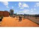 Relaxing rooftop deck offering multiple seating areas and city views at 115 W Peachtree Nw # 704, Atlanta, GA 30313