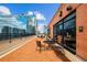 Spacious rooftop deck with patio furniture and city views at 115 W Peachtree Nw # 704, Atlanta, GA 30313