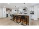 Modern kitchen with white cabinets, quartz countertops and herringbone backsplash at 2019 Emerald Dr, Jonesboro, GA 30236