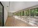 Long screened porch overlooking the backyard at 2019 Emerald Dr, Jonesboro, GA 30236