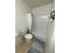 Clean bathroom with a bathtub and shower at 2201 Cumberland Se Ct, Smyrna, GA 30080