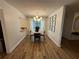 Modern dining area featuring a round table, wood floors, and stylish light fixture at 2201 Cumberland Se Ct, Smyrna, GA 30080