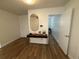 Entryway with wood floors and contemporary console table at 2201 Cumberland Se Ct, Smyrna, GA 30080