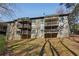 Multi-story apartment complex featuring private balconies with views of the surrounding landscape at 2201 Cumberland Se Ct, Smyrna, GA 30080