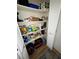 Well-organized storage closet with shelving at 2201 Cumberland Se Ct, Smyrna, GA 30080