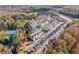 Aerial view of townhouses, tennis court, and trees at 3939 Glenview Club Ln, Duluth, GA 30097