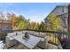 Relaxing deck with seating area and view of trees at 3939 Glenview Club Ln, Duluth, GA 30097