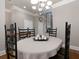 Bright dining room with hardwood floors and chandelier at 62 Emerson Hill Sq, Marietta, GA 30060