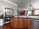 Kitchen island with granite countertop and hardwood floor at 62 Emerson Hill Sq, Marietta, GA 30060