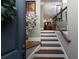 View of a wooden staircase from the foyer, leading to the upper floors at 62 Emerson Hill Sq, Marietta, GA 30060