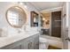 Modern bathroom with a glass shower and updated vanity at 868 E Ponce De Leon Ave, Decatur, GA 30030