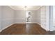 Formal dining room with hardwood floors and built-in shelving at 868 E Ponce De Leon Ave, Decatur, GA 30030