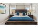 Main bedroom with king-size bed and blue bedding at 527 Lanier Way, Temple, GA 30179