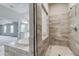 Modern bathroom with a large walk-in shower and soaking tub at 121 Frontier Way, Mcdonough, GA 30253
