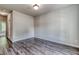 Spacious bedroom with hardwood floors and a large window at 121 Frontier Way, Mcdonough, GA 30253