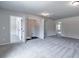 Large bonus room with laundry alcove and access to bedrooms at 121 Frontier Way, Mcdonough, GA 30253