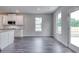 Bright breakfast area with hardwood floors and access to the backyard at 121 Frontier Way, Mcdonough, GA 30253