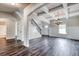 Open dining room with hardwood floors and access to kitchen at 121 Frontier Way, Mcdonough, GA 30253