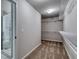 Spacious walk-in closet with ample shelving and carpeting at 121 Frontier Way, Mcdonough, GA 30253