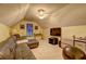 Spacious bonus room featuring a large sectional sofa and flat-screen TV at 160 Valley Brook Dr, Covington, GA 30016