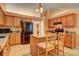 Kitchen with granite countertops and wood cabinets at 160 Valley Brook Dr, Covington, GA 30016