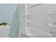 Clean bathroom with shower/tub combo and decorative shower curtain at 525 Nolden Trl, Dacula, GA 30019