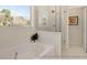 Luxurious bathroom with soaking tub, walk-in shower, and modern vanity at 525 Nolden Trl, Dacula, GA 30019