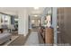 Bright and spacious entryway with views into the dining and living areas at 525 Nolden Trl, Dacula, GA 30019
