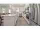 Modern kitchen featuring stainless steel appliances and white cabinetry at 525 Nolden Trl, Dacula, GA 30019