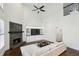 Two-story Gathering room with fireplace, built-in shelving, and hardwood floors at 1052 Brookhaven Ne Walk, Brookhaven, GA 30319