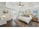 Spacious main bedroom with a king-size bed and en-suite bathroom at 1052 Brookhaven Ne Walk, Brookhaven, GA 30319