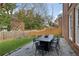 Outdoor patio with seating area and gravel landscaping at 1052 Brookhaven Ne Walk, Brookhaven, GA 30319