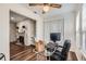 Home office near fireplace, featuring hardwood floors and built-in shelving at 1945 Brian Way, Decatur, GA 30033