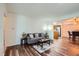 Living room with hardwood floors and view into dining area at 1945 Brian Way, Decatur, GA 30033