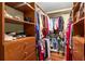 Large walk-in closet with ample shelving and hanging space at 200 River Vista Dr # 427, Atlanta, GA 30339