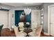 Elegant dining area with glass table and modern chairs at 200 River Vista Dr # 427, Atlanta, GA 30339