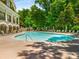 Resort-style pool with plenty of lounge chairs at 200 River Vista Dr # 427, Atlanta, GA 30339