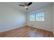 Well-lit bedroom, featuring hardwood floors and a ceiling fan at 2698 Farmstead Se Rd, Smyrna, GA 30080