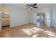 Bright bedroom with wood floors and ensuite bathroom access at 2698 Farmstead Se Rd, Smyrna, GA 30080